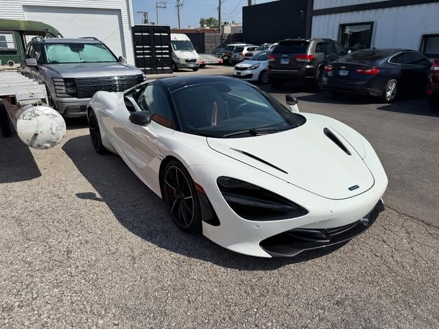 White McLaren protected with paint protection film